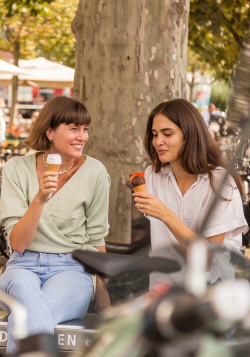 Two women eating ice cream